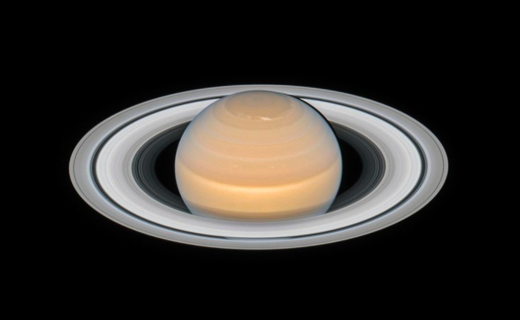 Saturno visto por telescopio